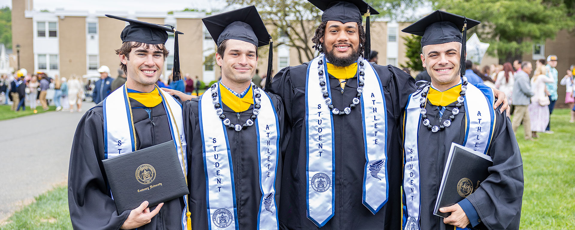 group of men standing together at graduation