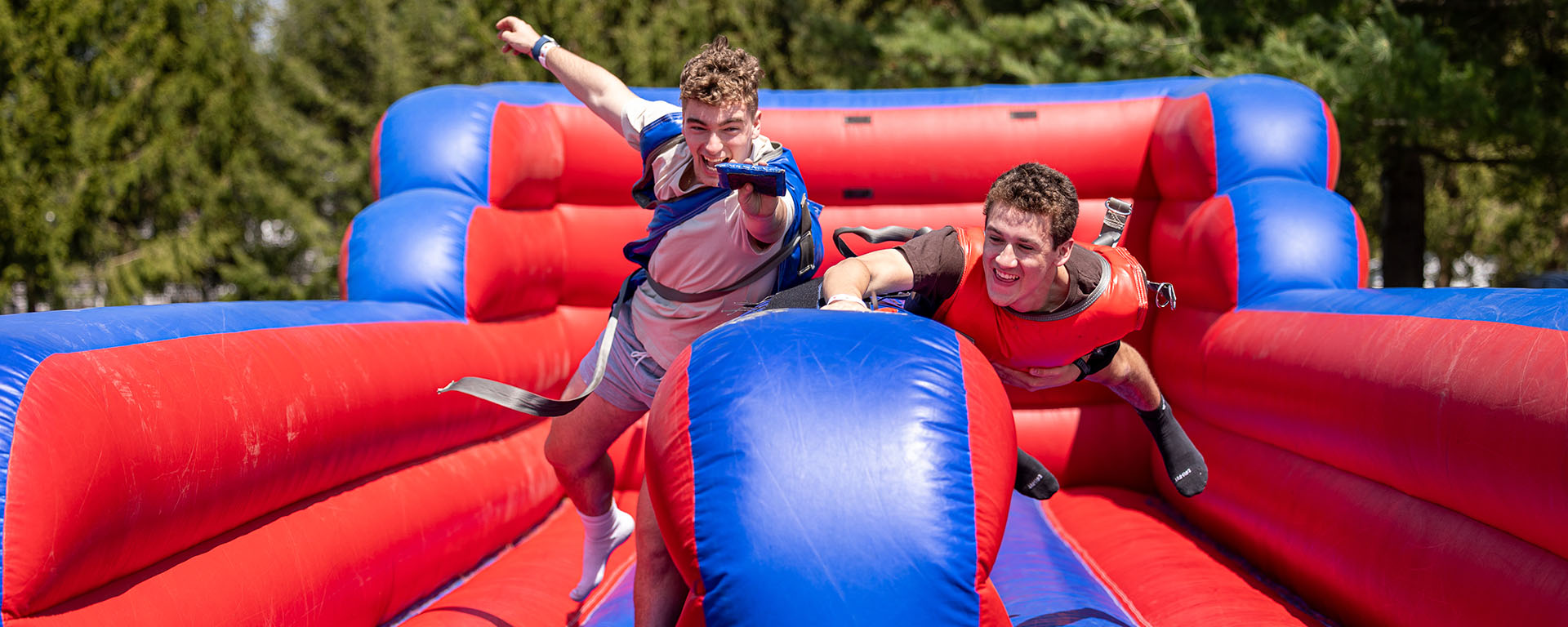 studentlife two buys running on inflatable