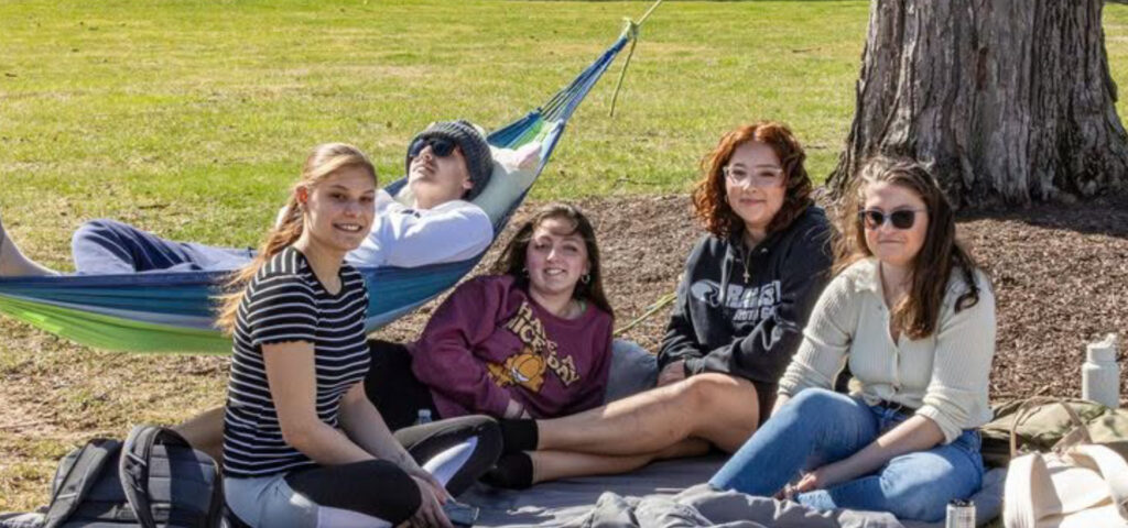 Students On Campus Grass Students On Campus Grass 1024x480